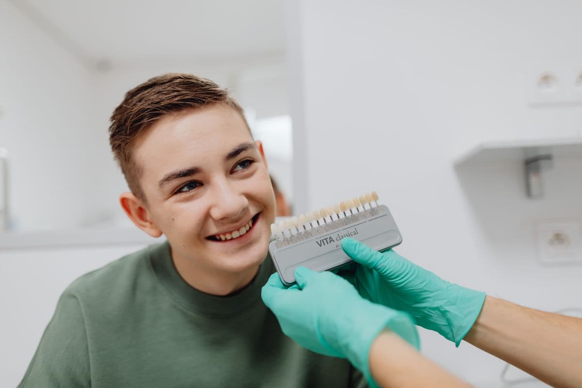Boy smiling during pediatric dental visit